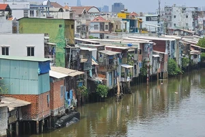 On and along Doi Canal in District 8, there are thousands of shabby, unsafe houses