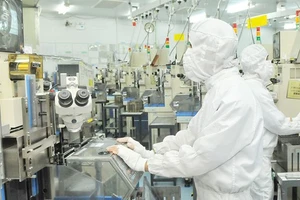 Sản xuất linh kiện IC bán dẫn tại Công ty Mtex (Nhật Bản) trong KCX Tân Thuận, TPHCM. Ảnh: CAO THĂNG