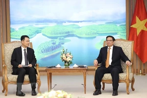 Thủ tướng Phạm Minh Chính tiếp Bộ trưởng Bộ Công Thương Lào Malaythong Kommasith. Ảnh: TXVN