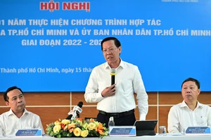 Chủ tịch UBND TPHCM Phan Văn Mãi phát biểu tại hội nghị sơ kết công tác phối hợp giữa TPHCM và ĐH Quốc gia TPHCM. Ảnh: THANH HÙNG