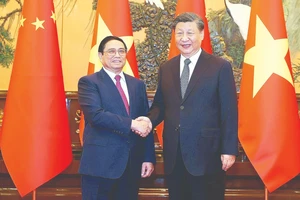 Thủ tướng Phạm Minh Chính hội kiến Tổng Bí thư, Chủ tịch Trung Quốc Tập Cận Bình. Ảnh: TTXVN