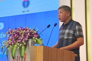 Ông Nguyễn Hoàng Mai, Phó Chủ nhiệm Ủy ban Xã hội của Quốc hội phát biểu khai mạc hội thảo