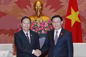 Quốc hội Việt Nam và Lào chia sẻ kinh nghiệm trong hoàn thiện hệ thống pháp luật