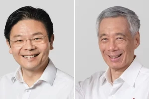 Thủ tướng Singapore Lý Hiển Long (phải) và Phó Thủ tướng Singapore Lawrence Wong (trái). Ảnh: PEOPLE'S ACTION PARTY