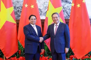 Thủ tướng Phạm Minh Chính và Thủ tướng Trung Quốc Lý Cường. Ảnh: VGP