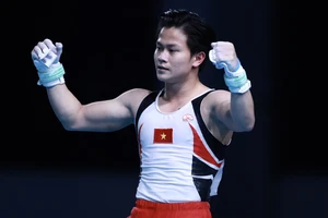 Khánh Phong hoàn thành bài dự thi vòng treo với số điểm cao nhất 14.200. Ảnh: DŨNG PHƯƠNG