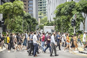 Singapore tập trung thu hút nhân tài hàng đầu để không tụt lại phía sau. Ảnh: Bloomberg