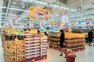 Chợ tăng giá, siêu thị khuyến mãi “kìm giá”