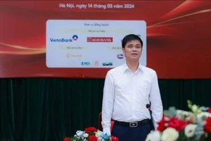 Ông Ngọ Duy Hiểu, Phó Chủ tịch Tổng Liên đoàn Lao động Việt Nam phát biểu tại cuộc họp báo. Ảnh: HẢI NGUYỄN