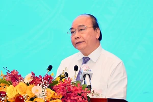 Chủ tịch nước Nguyễn Xuân Phúc phát biểu tại Hội thảo. Ảnh: VIỆT DŨNG