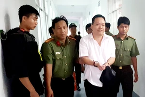 Nguyễn Huỳnh Đạt Nhân, Giám đốc Công ty Tây Nam lúc mới bị bắt. Ảnh: LÊ PHƯƠNG