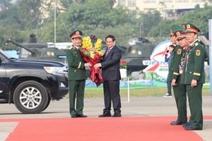 Prime Minister Pham Minh Chinh attends the opening ceremony of the Vietnam International Defense Expo 2024 held at Gia Lam Airport in Hanoi on December 19. (Photo: SGGP)