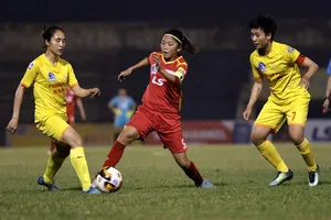 Huỳnh Như và các đồng đội kéo dài mạch trận bất bại lên con số 9. Ảnh: Anh Trần