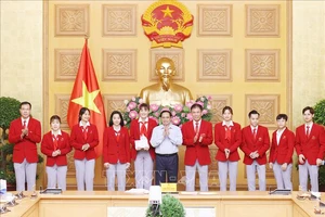 Thủ tướng Chính phủ Phạm Minh Chính động viên các tuyển thủ VIệt Nam trước khi lên đường tham dự Olympic Tokyo 2020. Ảnh: TTXVN