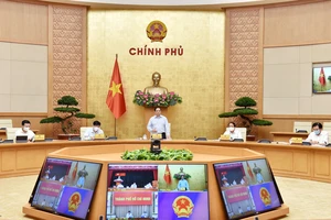 Thủ tướng Phạm Minh Chính chủ trì và phát biểu tại cuộc họp trực tuyến với lãnh đạo Thành phố Hồ Chí Minh về triển khai các biện pháp phòng, chống dịch Covid-19, ngày 8-7. Ảnh: VIẾT CHUNG