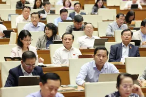 Các đại biểu Quốc hội dự phiên họp sáng 30-10. Ảnh: QUANG PHÚC