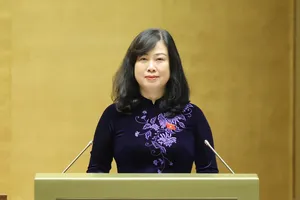 Bộ trưởng Bộ Y tế Đào Hồng Lan trình bày tiếp thu về dự thảo Luật Dân số. Ảnh: QUANG PHÚC