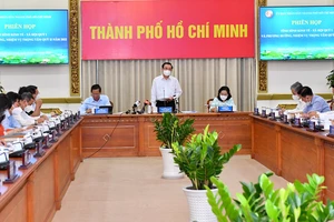 Buổi họp kinh tế - xã hội quý 1-2022 và nhiệm vụ trọng tâm quý 2-2022. Ảnh: VIỆT DŨNG