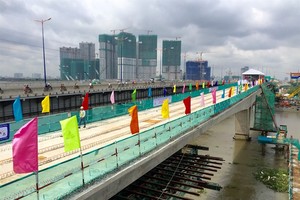 The total investment for Metro Line No 1 in HCM City after three adjustments has increased from VND14.415 trillion ($631 million) to VND47.325 trillion ($2.07 billion). The PM has agreed to advance ODA capital for the project. (Photo: VNA)