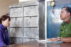 Ms. Linh is at police station (Photo: SGGP)