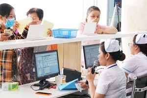 HCMC tightens health insurance regulations