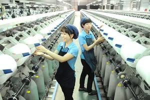 Workers of Thai Tuan Textile and Garment are producing commdities for exports to Middle East (Photo: SGGP)