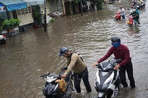 The basic cause of urban flooding in HCMC is the unsuccessful sewage treatment