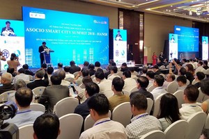 The Chairman of the Hanoi People’s Committee Nguyen Duc Chung delivered his opening speech at the ASOCIO Summit. Photo by Tran Binh