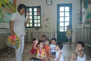 At a child protection shelter in Vietnam (Photo: VNA)