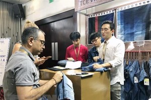 A booth at the Denims and jeans Vietnam exhibition. The denim production sector has high growth potential and is seeing more and more investors, experts say. - VNA Photo My Phương