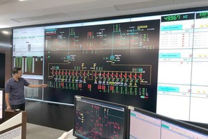 The HCMC Electricity Company (EVNHCMC) is applying IT into its operation and management task for the smart electricity system. (Photo: SGGP)