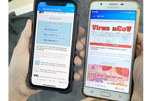 Information about nCoV appears on mobile apps. (Photo: SGGP)