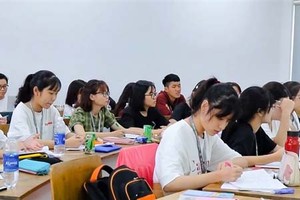 Students of a high-quality program in the University of Economics and Law (Vietnam National University HCMC) in their theory lesson. (Photo: SGGP)