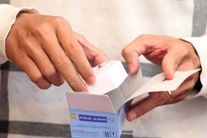 The nCoV test kit made in Vietnam (Photo: SGGP)