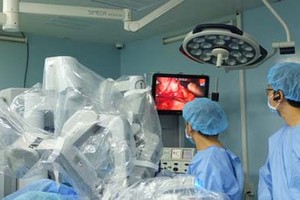 A surgery performed by robot in Binh Dan Hospital. (Photo: SGGP)