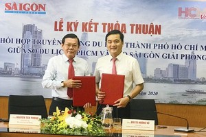 At the signing ceremony (Photo: SGGP)