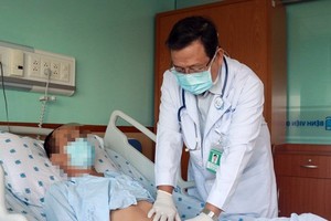 The man after the surgery (Photo: SGGP)