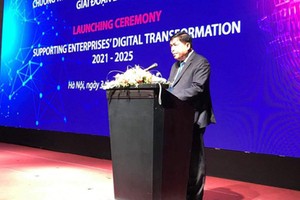 Minister of Planning and Investment Nguyen Chi Dung is delivering his speech in the ceremony (Photo: SGGP)