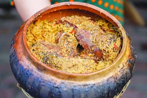 The braised fish clay pot (Photo: SGGP)