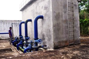 The water plant in the two communes. water contamination is highly likely to be the source of poisoning cases (Photo: SGGP)