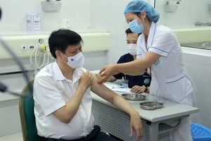 Health minister and deputies receive AstraZeneca COVID-19 shots