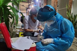 HCMC announces 25 new suspected Covid-19 cases from religious mission 