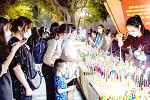 Hanoi sees visitors bustling again