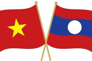 Top leaders congratulate Laos on National Day