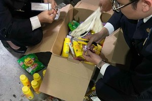 Customs officials detect drugs disguised under bags of chocolate candy