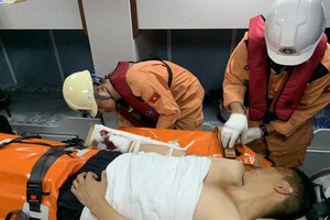 Chinese sailor brought ashore for treatment in Khanh Hoa