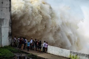 Reservoirs nearly overflow, hydropower plants release floodwaters