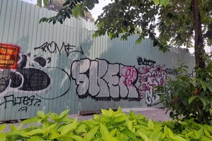 HCMC cracks down on graffiti and illegal ads