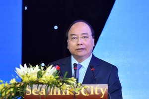 Vietnamese Prime Minister Nguyen Xuan Phuc speaks at the Binh Thuan Investment Promotion Conference