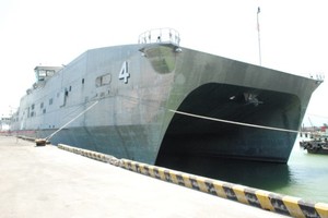 USNS Fall River (T-EPF-4) of the United States Military Sealift Command docks at Tien Sa port